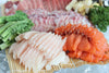 Cod Sashimi with salmon sashimi and greens