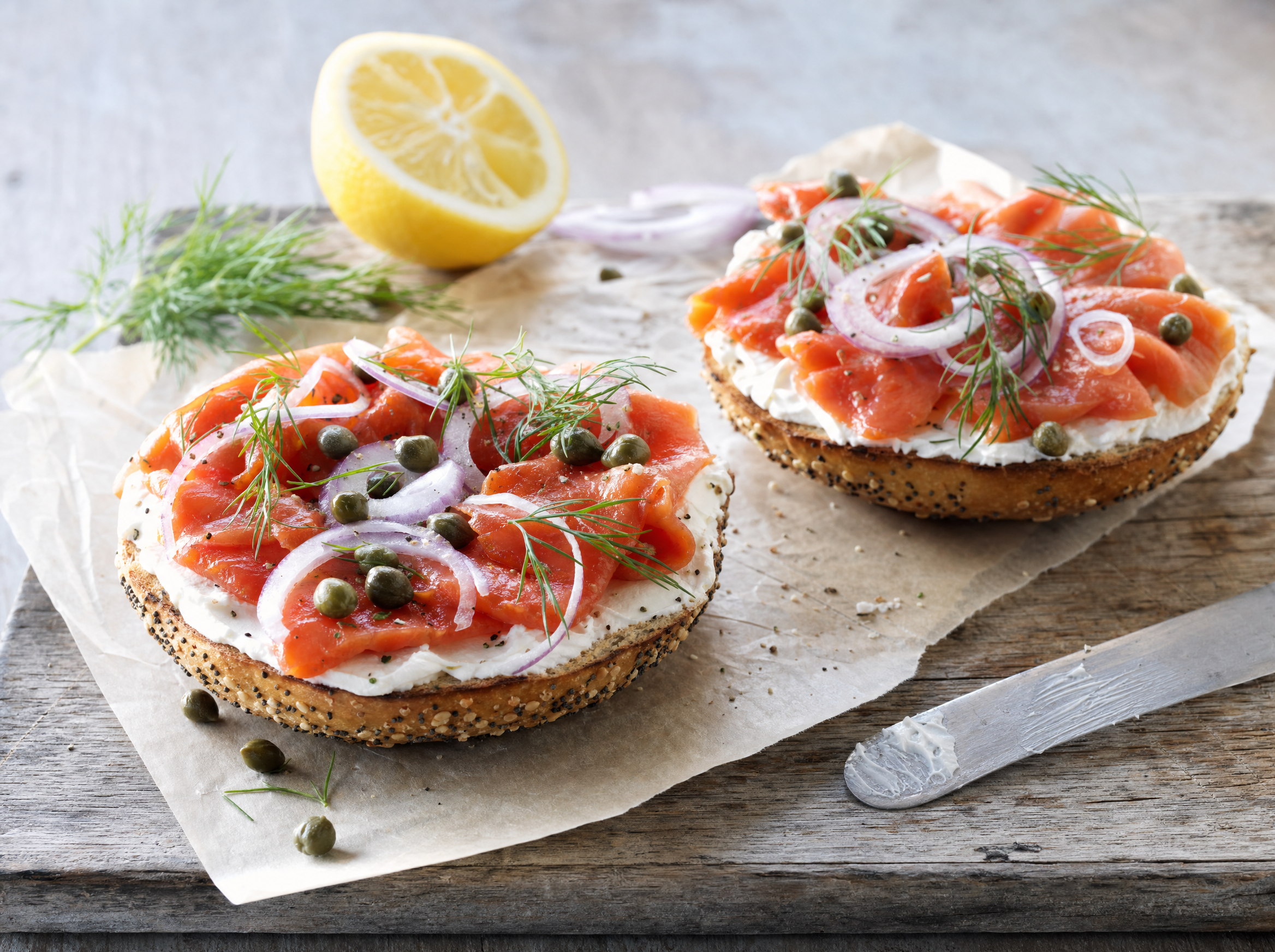 Cold-smoked salmon on everything bagel with cream cheese and capers