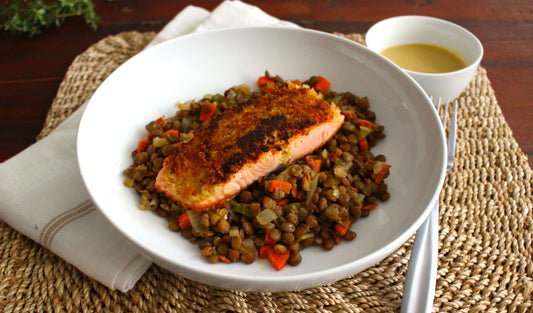 Breadcrumb encrusted salmon ontop of lentils