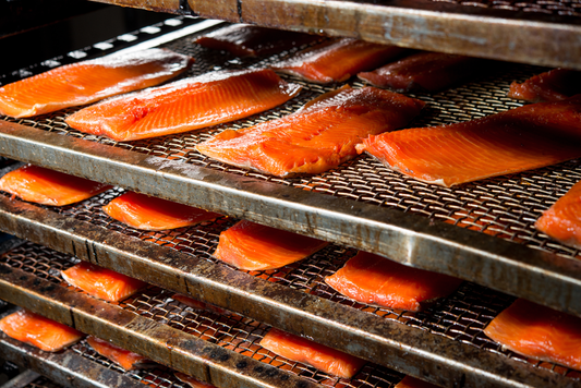 Salmon on trays ready to be smoked