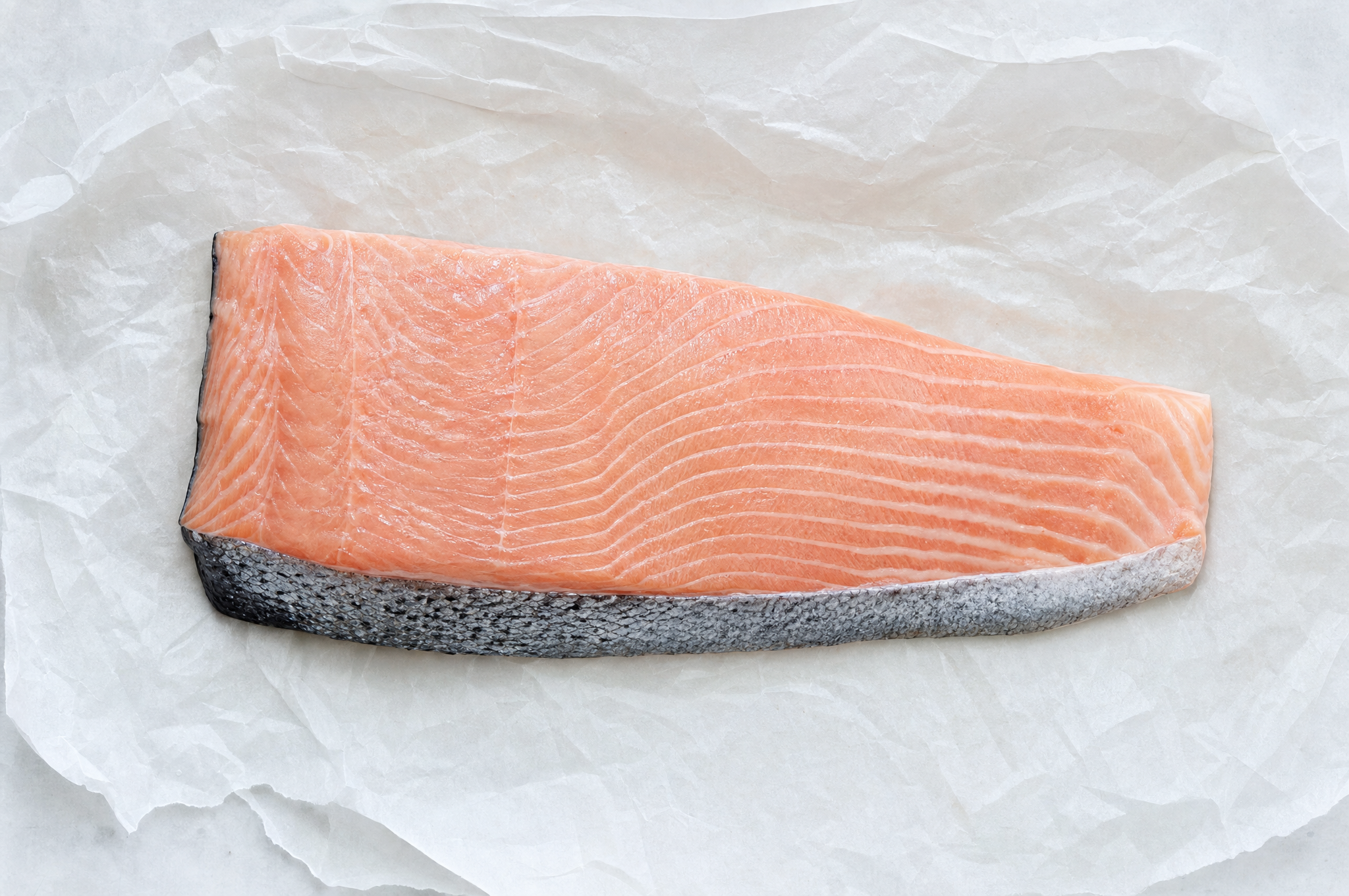 Wild pink salmon fillet on parchment