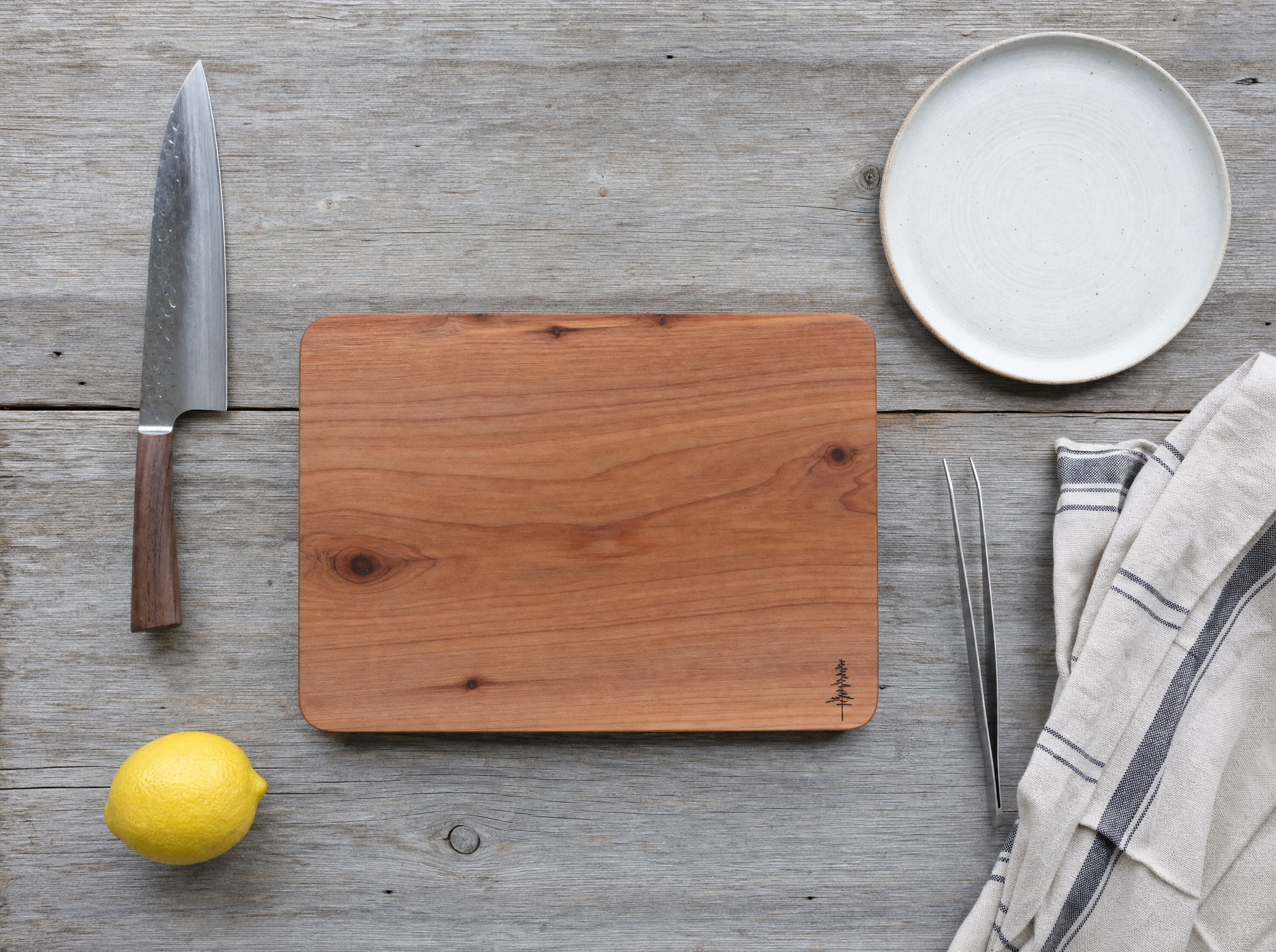 Seafood kitchen tools and plate flat lay